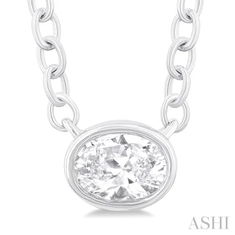 1/6 Ctw Petite East-West Bezel Set Oval Cut Diamond Fashion Pendant With Chain in 10K White Gold