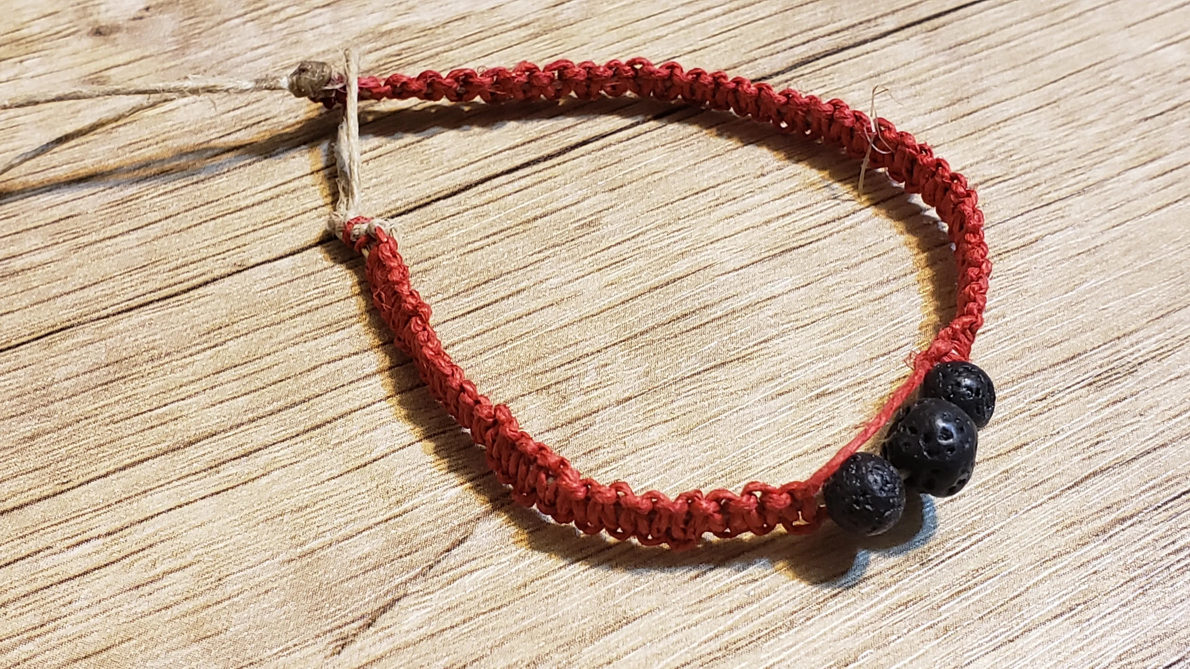 Red Natural Hemp Bracelet with Lava Rocks. 