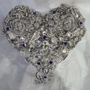 Something blue Brooch bouquet Heart shaped, trailing,cascading, jewel heart wedding bouquet. by Crystal wedding uk